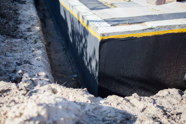 Professional Wet Basement Repair technician working in Junction City, OH